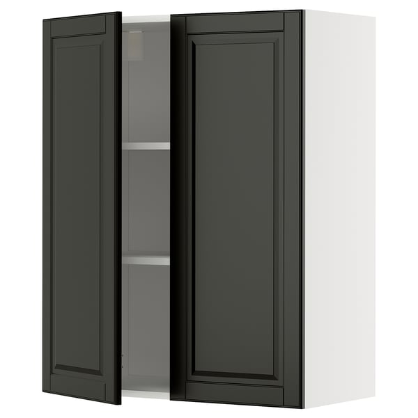 A black METOD kitchen wall cabinet with a bevelled edge door. Its rectangular, with two open doors revealing an adjustable shelf.
