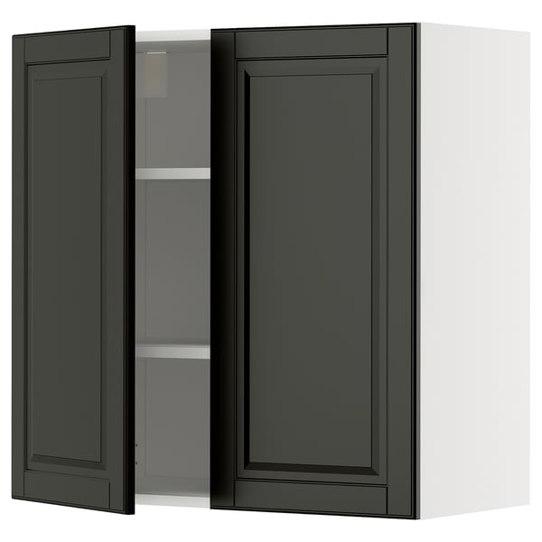 A black METOD kitchen wall cabinet with two doors open, revealing an adjustable shelf inside.