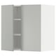 A light grey METOD kitchen cabinet with two shelves and a modern design.