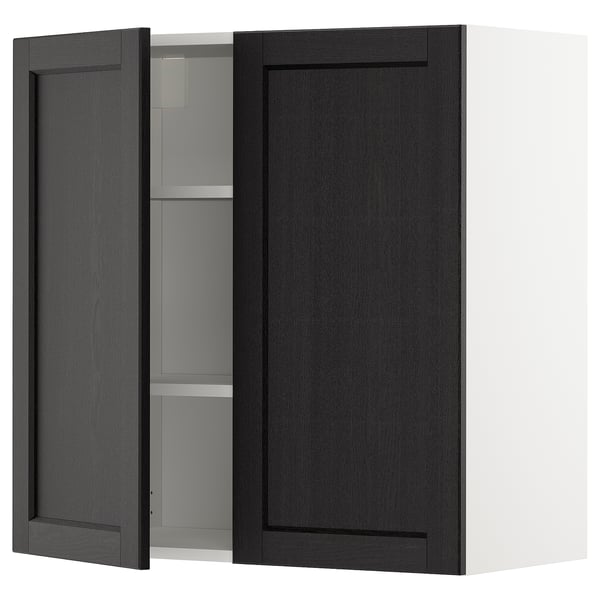 A black stained lerhyttan METOD kitchen wall cabinet with one door open, revealing an adjustable shelf inside.