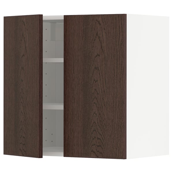 Dark brown METOD wall cabinet with one door open, showcasing oak veneer and adjustable shelves.