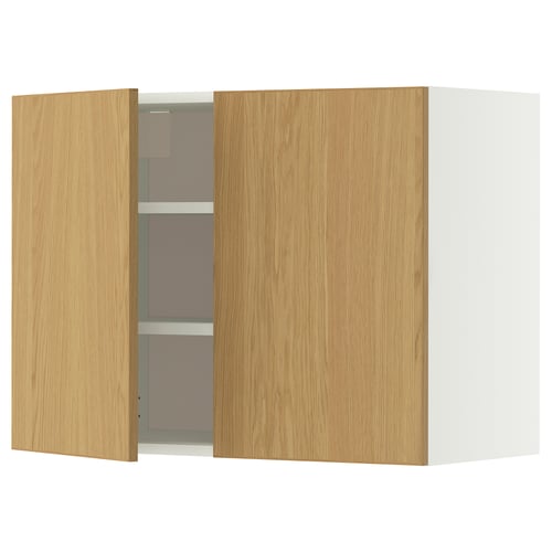 A wooden kitchen cabinet with light oak doors and multiple shelves.