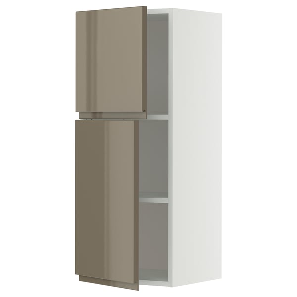 Modern, tall, white kitchen cabinet with dark grey-brown high gloss doors, two adjustable shelves, opened.