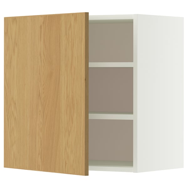 A METOD wall cabinet. It a light oak door and a white frame with two shelves inside. The cabinet is rectangular with a modern design.