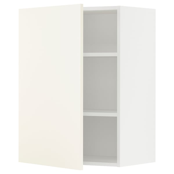 The white METOD kitchen cabinet with a sleek, modern design. It has two shelves inside and a reversible door.