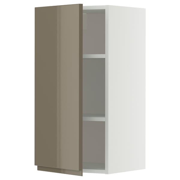 Modern METOD wall cabinet in white with high gloss dark grey-brown door, adjustable shelves, sleek design.