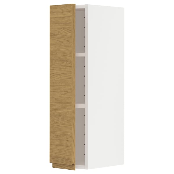 White and oak METOD kitchen cabinet with minimalist design and nickel-plated hinges.