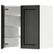 Modern kitchen cabinet in black stain with adjustable shelves and reversible door.