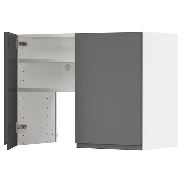 A grey METOD kitchen cabinet with a modern design. It a dark grey door with a white interior, adjustable shelves, and sturdy construction.