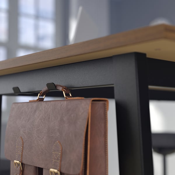 Brown leather bag hangs on black hook below wooden shelf.