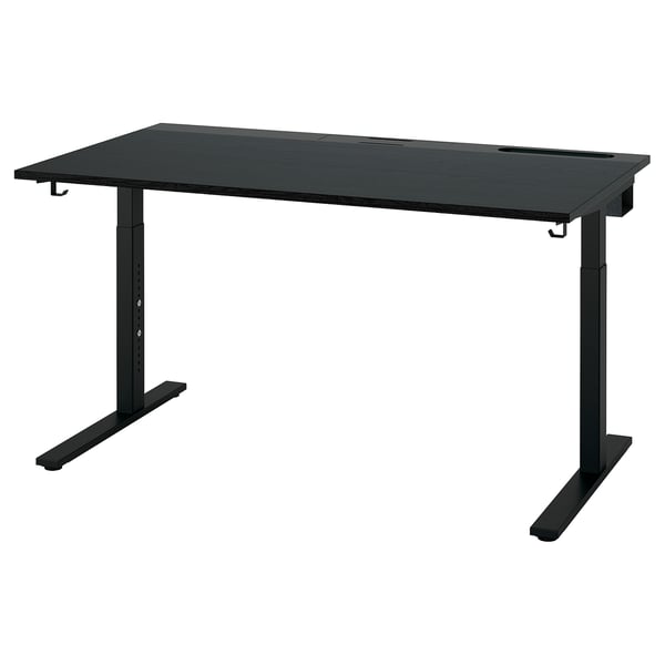 MITTZON black adjustable desk with wooden top, metal legs, hooks for headphones, and cable management tray.