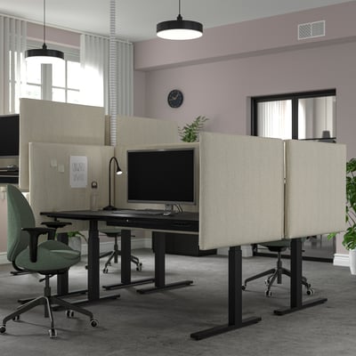 Modern office with MITTZON sit/stand desks, ergonomic chairs, and acoustic screens.