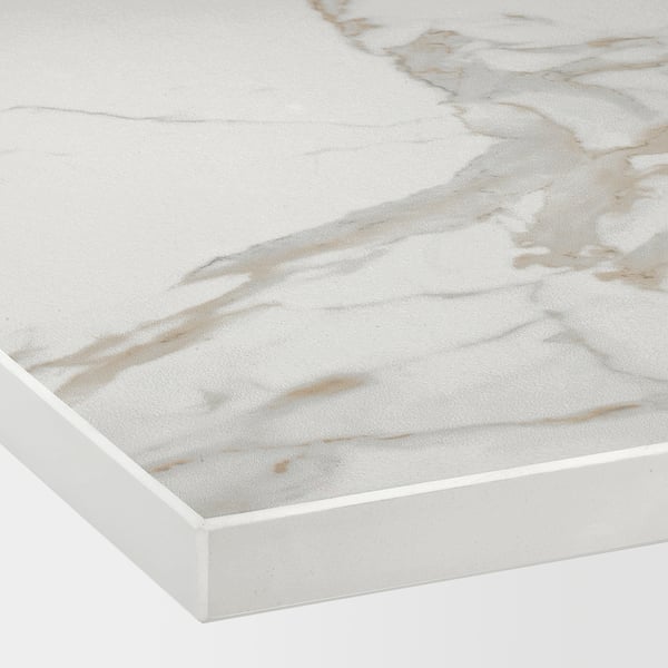 Close-up of sleek, white, high-pressure porcelain worktop, showcasing its smooth, scratch-resistant surface and clean, polished edge.
