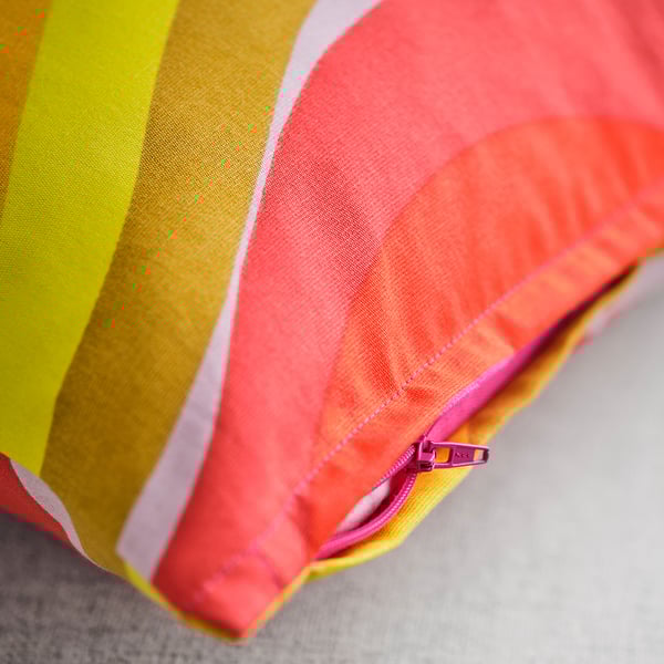 Colourful cushion cover with zip, wave stripes in yellow, orange, pink. Fabric quality.