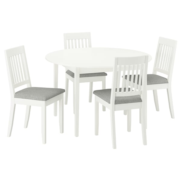 Round white dining set with 4 grey-cushioned chairs.