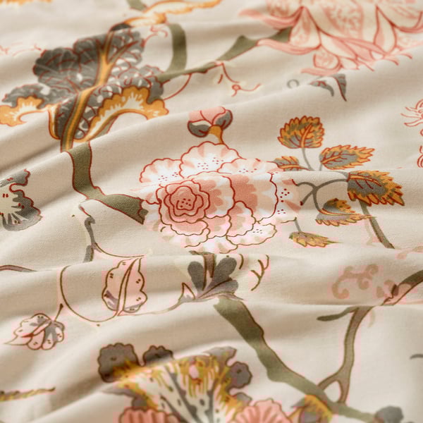 Beige floral patterned bed sheet with soft cotton-viscose blend, detailed embroidered blooms and leaves, thick fretwork design.