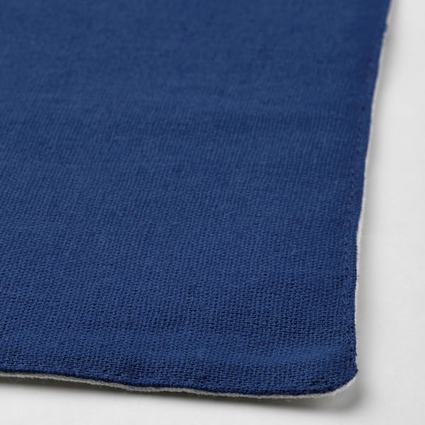 Reversible blue cotton place mat, high-quality fabric, neatly stitched edges.