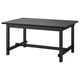 NORDVIKEN: black wood dining table; rectangular, sturdy, with self-storing leaves.