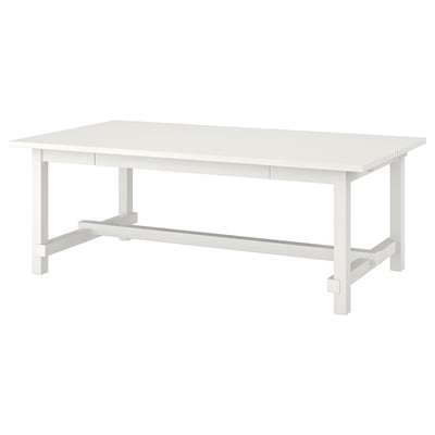 NORDVIKEN white wooden rectangular dining table with extension capabilities.
