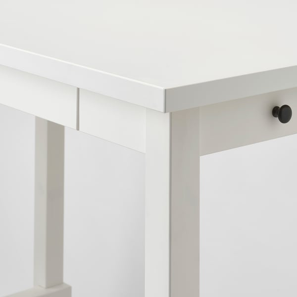 Close-up of NORDVIKEN tables sturdy corner joint, showing clean, precise craftsmanship and quality build.