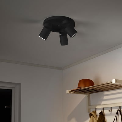Black ceiling light with three adjustable spotlights.