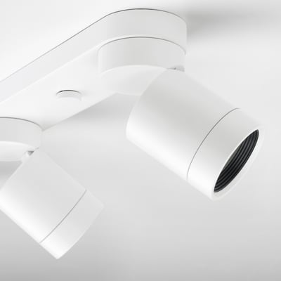 Modern white ceiling spots. Three adjustable lights in sleek design.