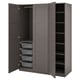 An open grey PAX wardrobe with mesh baskets and shelves.