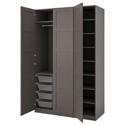A gray ikea PAX wardrobe, open, revealing shelves and mesh baskets.