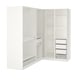 White PAX corner wardrobe system with adjustable shelves and mesh baskets.
