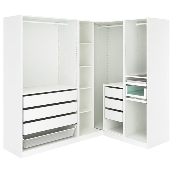 A white corner PAX wardrobe with adjustable shelves and drawers, featuring a mesh basket and a trouser hanger.