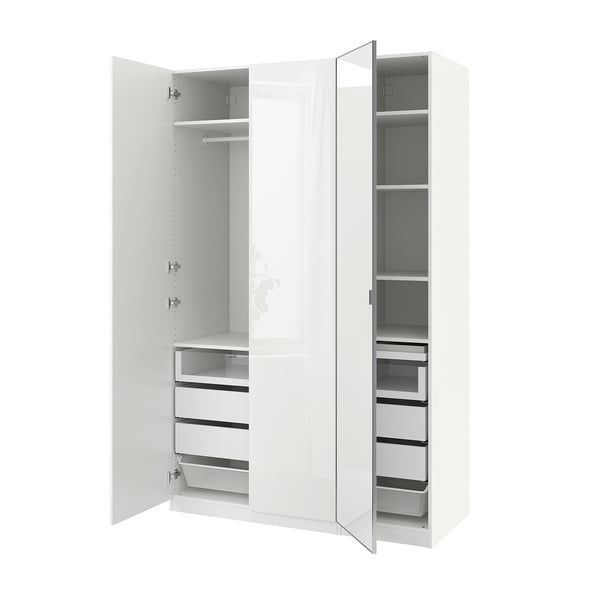 Open white wardrobe with drawers and shelves, featuring mirrored doors and soft closing hinges.