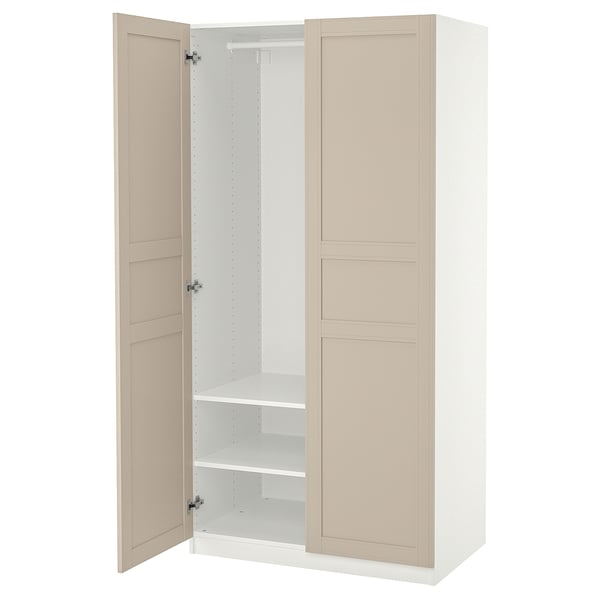 A white IKEA PAX wardrobe with beige doors, open to reveal internal shelves and a hanging rod.