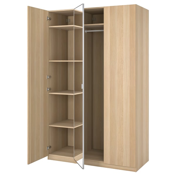 Wooden wardrobe, PAX, light brown, rectangular, modular design, mirrored doors open.
