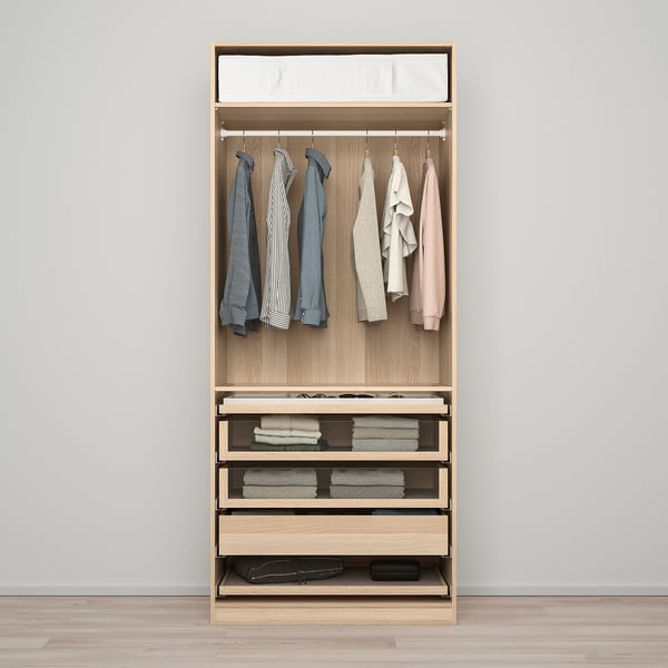 Wooden wardrobe organiser with hangers, shelves, and drawers.