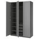 A grey PAX wardrobe with open doors, revealing shelves and a mesh basket.