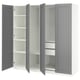 A gray ikea PAX wardrobe with open sections, featuring shelves, drawers, and hanging space.