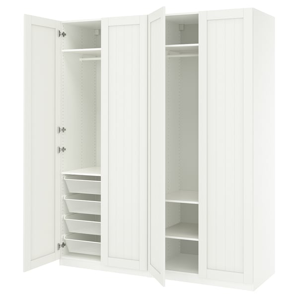 White ikea PAX wardrobe open, showing shelves and mesh baskets. Modern, minimalist design.