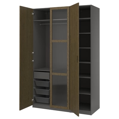 Open wardrobe with wood finish, glass door, shelves, and drawers.