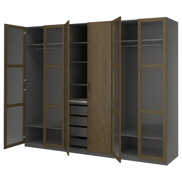 Mainstays PAX wardrobe: brown oak doors, black interior, 3 sections, hanging and shelf storage.