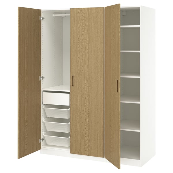 A white and light wooden PAX wardrobe with open doors, displaying shelves and mesh drawers.