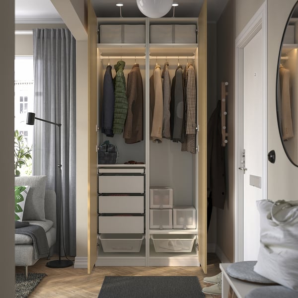 Modern wardrobe with drawers, shelves, and hanging space for clothes and accessories, featuring integrated lighting and adjustable feet.