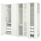 A white IKEA PAX wardrobe with open doors, revealing shelves and drawers inside.