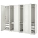 White PAX wardrobe with open doors revealing shelves and drawers, made of particleboard and fiberboard, standing against a white background.