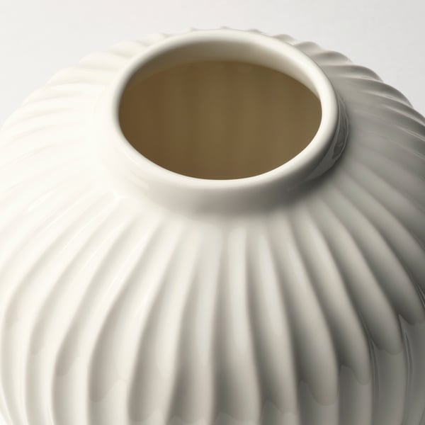 Elegant white vase with smooth, glossy glaze and intricate grooved texture, showcasing high-quality craftsmanship.