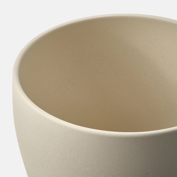 Cylindrical beige planter, smooth matte finish. High-quality earthenware with even pigmented coating.