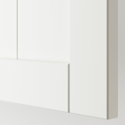 Crisp white drawer front with classic beadboard design, clean edges, and smooth finish.