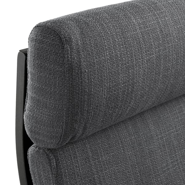 A corner of a dark grey upholstered chair with a robust, curved backrest, highlighting its durable, comfortable, and supportive design.