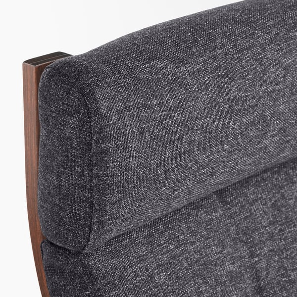 Close-up of a high-quality, upholstered POÄNG chair, showing comforting, tufted cushion and sturdy wooden frame.