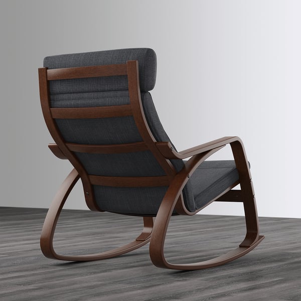 Dark grey fabric rocking chair with wooden frame against a grey wall. High back and cushioned seat for comfort.