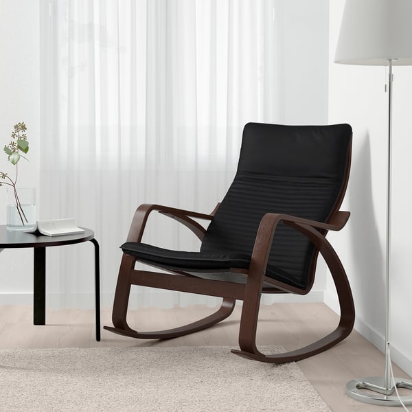 Modern chair with dark cushions and wooden frame; designed for comfort and relaxation.